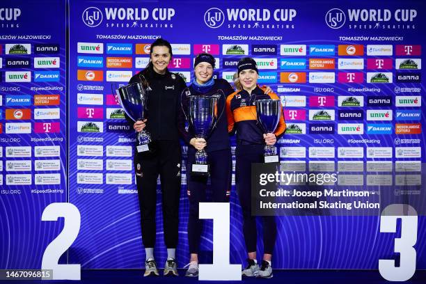 Isabelle Weidemann of Canada, Ragne Wiklund of Norway and Joy Beune of Netherlands pose in the Women's long distances overall World Cup...