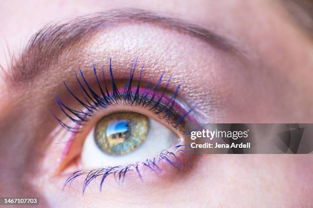 eye closeup: long eyelashes blue mascara colorful makeup eyeliner - colorful eye liner stock pictures, royalty-free photos & images