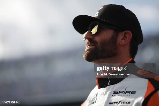 Corey LaJoie, driver of the Schluter Systems Chevrolet, looks on during qualifying for the NASCAR Craftsman Truck Series NextEra Energy 250 at...