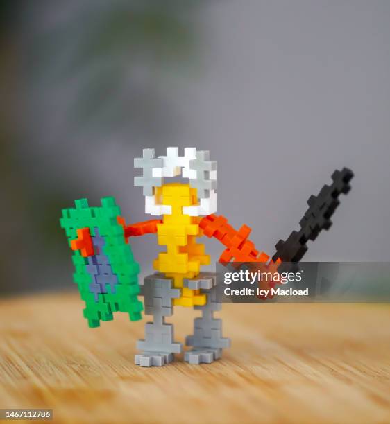 knight with his sword and shield built from small toy piefes - toy sword stock pictures, royalty-free photos & images