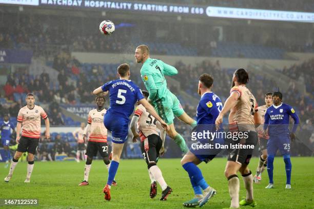 Joe Lumley of Reading FC topp off a header from a corner during the Sky Bet Championship between Cardiff City and Reading at Cardiff City Stadium on...