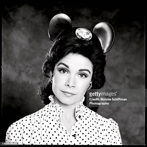 Annette Funicello wears Mickey Mouse Ears and a polka dot shirt in Los Angeles in 1983