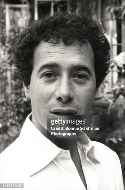 David Geffen wears a white collared shirt and stares at camera in Los Angeles in 1987.