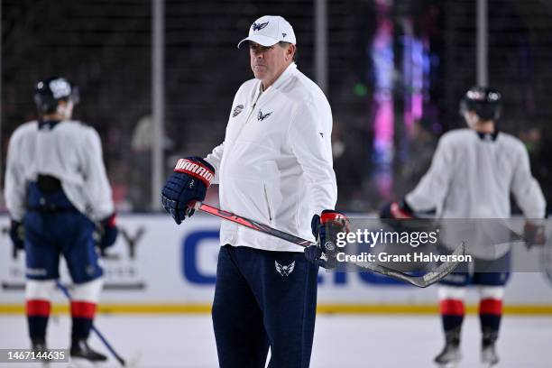 Head coach Peter Laviolette of the Washington Capitals watches his team during a practice session in advance of the 2023 Navy Federal Credit Union...