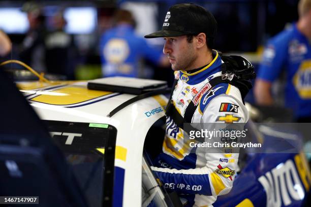 Chase Elliott, driver of the NAPA Auto Parts Chevrolet, enters his car in the garage area during practice for the NASCAR Cup Series 65th Annual...