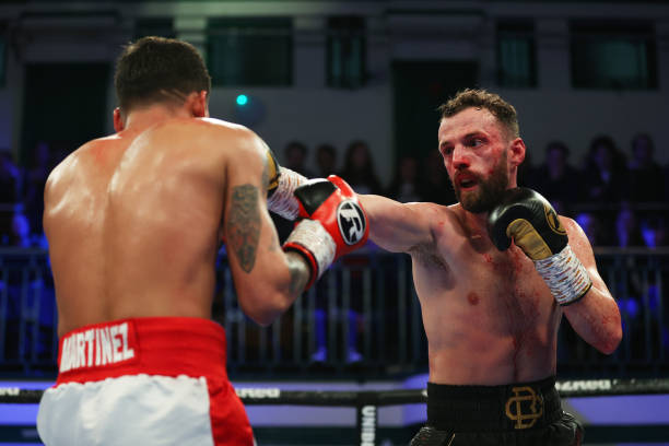 Chris Bourke punches Darwin Martinez during the Featherweight fight between Chris Bourke and Darwin Martinez at York Hall on February 17, 2023 in...