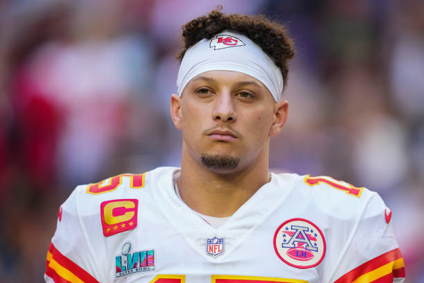 Patrick Mahomes of the Kansas City Chiefs stands during the national anthem against the Philadelphia Eagles after Super Bowl LVII at State Farm...