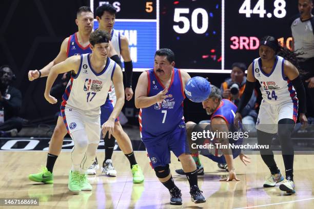 Personality Guillermo Rodriguez of Team Ryan dribbles against Team Ryan during the third quarter in the 2023 NBA All Star Ruffles Celebrity Game at...