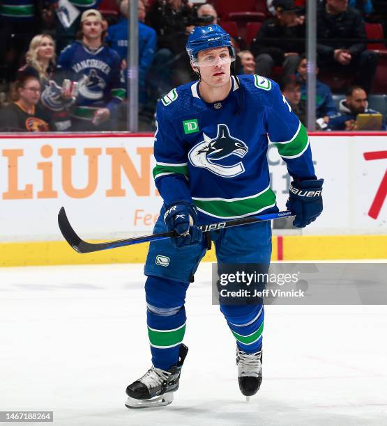 Luke Schenn of the Vancouver Canucks skates up ice during their NHL game against the New York Rangers at Rogers Arena February 15, 2023 in Vancouver,...