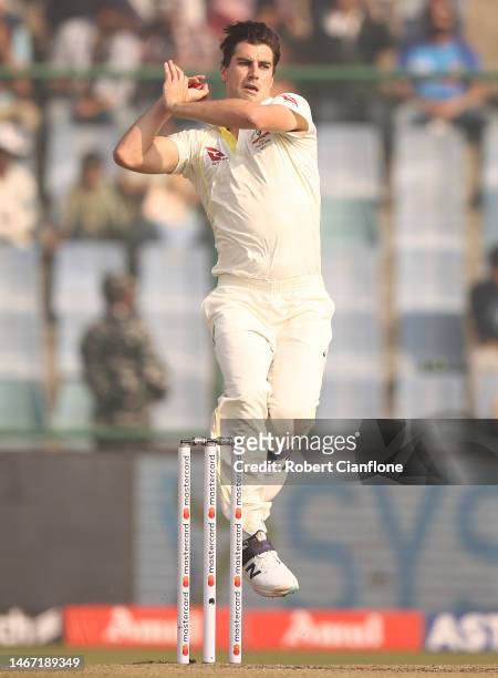 Pat Cummins of Australia bowls during day two of the Second Test match in the series between India and Australia at Arun Jaitley Stadium on February...