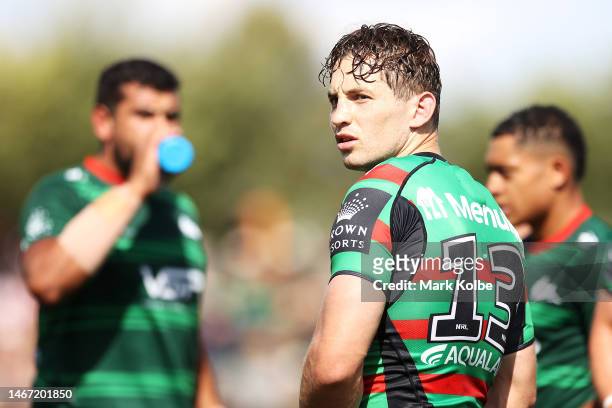 Cameron Murray of the Rabbitohs watches on during the warm-up before the NRL Trial and Charity Shield match between St George Illawarra Dragons and...
