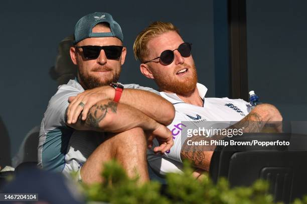 Brendon McCullum and Ben Stokes of England look on during day three of the First Test match in the series between New Zealand and England at Bay Oval...