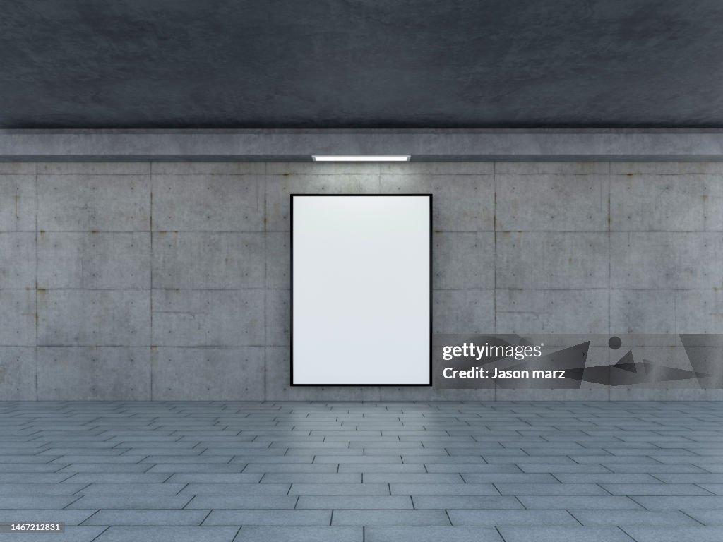Blank billboard advertising banner media display on a subway station wall