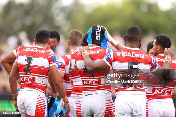 The Dragons players are seen during a drinks break due to hot weather during the NRL Trial and Charity Shield match between St George Illawarra...