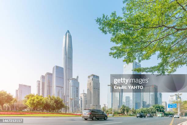 shenzhen futian cbd urban scenery and busy main road traffic - arbre main stock pictures, royalty-free photos & images