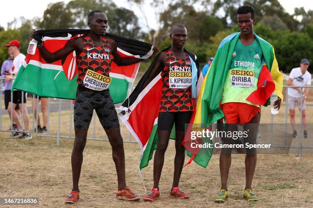 Reynold Kipkorir Cheruiyot of Team Kenya , Ishmael Kipkurui of Team Kenya and Boki Diriba of Team Ethiopia pose for a photo after the Men's U20s race...