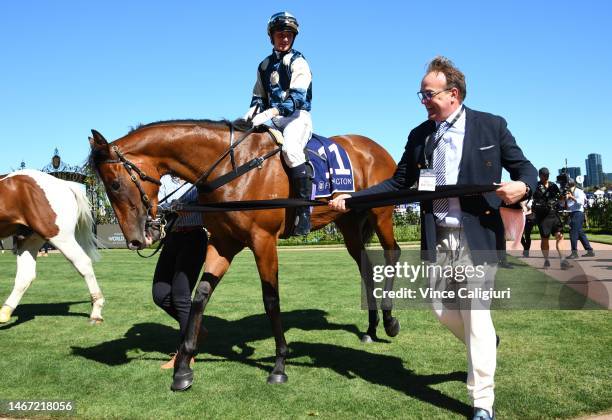 Jamie Kah and part owner John O'Neill after Coolangatta won race 7, the Black Caviar Lightning, during Melbourne Racing at Flemington Racecourse on...