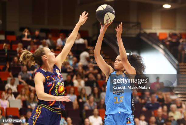 Rae Burrell of the Capitals shoots for the basket during the round 14 WNBL match between UC Capitals and Adelaide Lightning at The National...