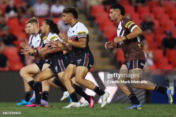 The Panthers warm up during the World Club Challenge and NRL Trial Match between the Penrith Panthers and St Helens at BlueBet Stadium on February...