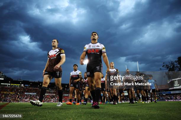 Nathan Cleary and Isaah Yeo of the Panthers walk from the field after warm up during the World Club Challenge and NRL Trial Match between the Penrith...