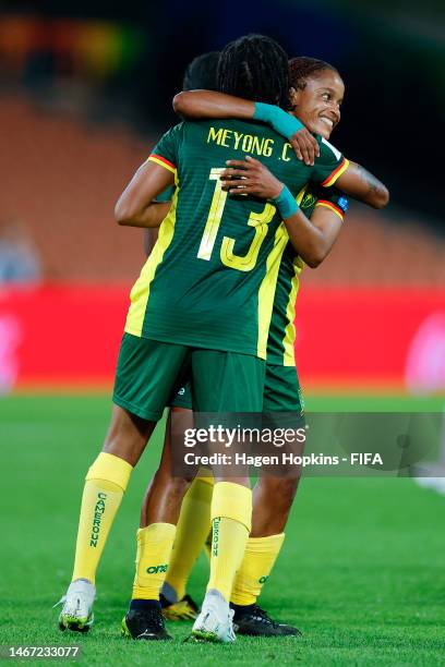 Jeannette Yango and Charlene Meyong of Cameroon celebrate the goal of Gabrielle Onguene during the 2023 FIFA Women's World Cup Play Off Tournament...