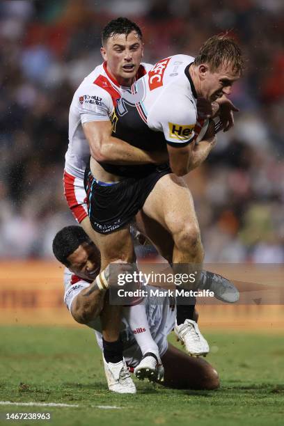 Zac Hosking of the Panthers is tackled during the World Club Challenge and NRL Trial Match between the Penrith Panthers and St Helens at BlueBet...