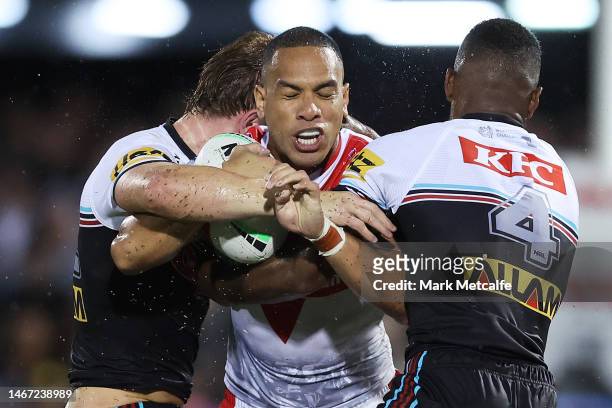 Will Hopoate of the Saints is tackled during the World Club Challenge and NRL Trial Match between the Penrith Panthers and St Helens at BlueBet...