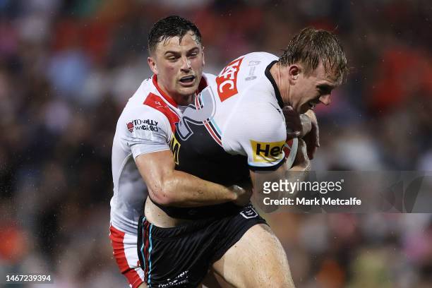 Zac Hosking of the Panthers is tackled during the World Club Challenge and NRL Trial Match between the Penrith Panthers and St Helens at BlueBet...