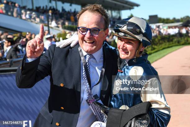 Jamie Kah poses with part owner John O'Neill after riding Coolangatta to win race 7, the Black Caviar Lightning, during Melbourne Racing at...