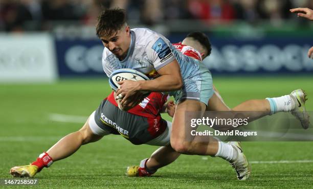 Cadan Murley of Harlequins is held by Charlie Chapman during the Gallagher Premiership Rugby match between Gloucester Rugby and Harlequins at...