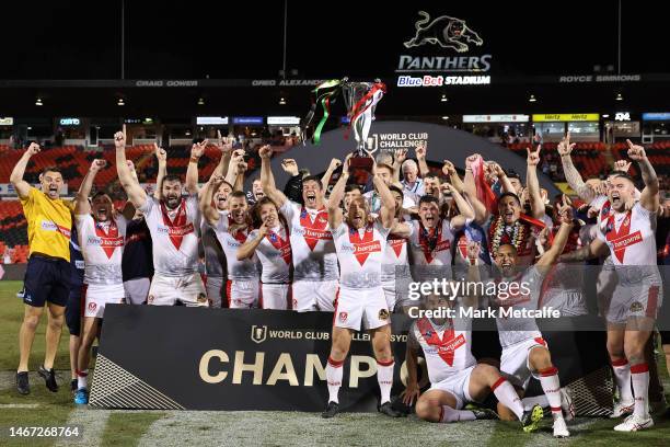 St Helens ccelebrate with the World Club Challenge trophy after victory during the World Club Challenge and NRL Trial Match between the Penrith...
