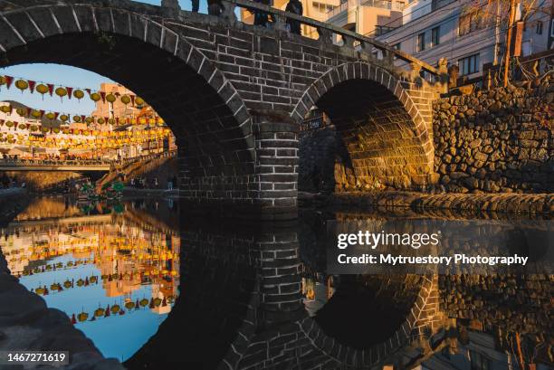 meganebashi bridge or spectacle bridge in sunset with lantern festival. - lantern festival ストックフォトと画像