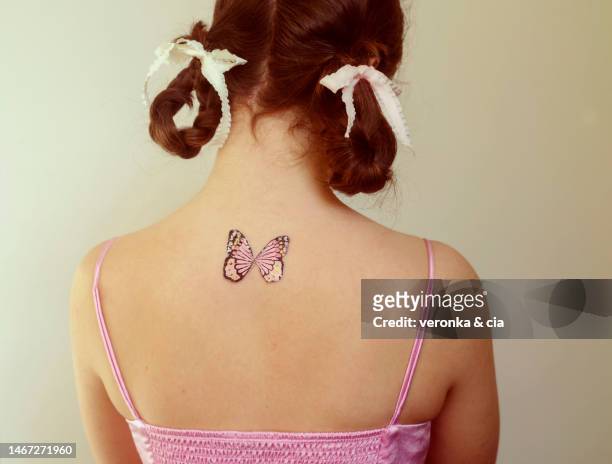 21 Of Butterfly Tattoos On Back Photos and Premium High Res Pictures -  Getty Images