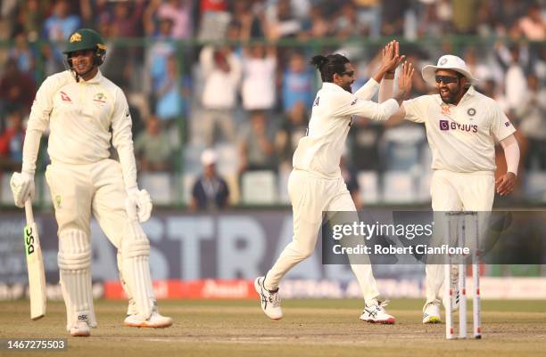Ravindra Jadeja of India celebrates taking the wicket of Usman Khawaja of Australia during day two of the Second Test match in the series between...