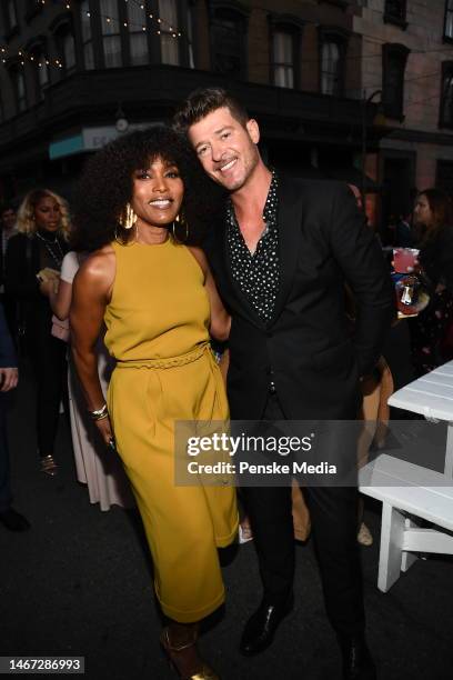 Angela Bassett and Robin Thicke