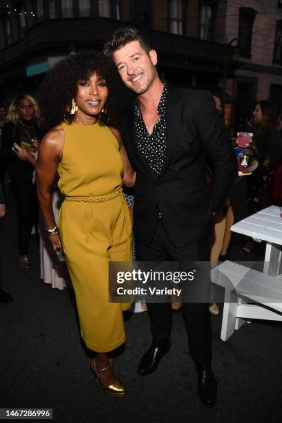 Angela Bassett and Robin Thicke