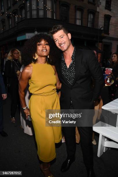 Angela Bassett and Robin Thicke