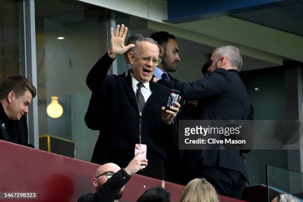 Actor Tom Hanks looks on from the stands prior to the Premier League match between Aston Villa and Arsenal FC at Villa Park on February 18, 2023 in...