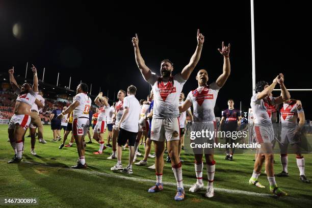 Alex Walmsley of the Saints celebrates with team. Mates after victory during the World Club Challenge and NRL Trial Match between the Penrith...