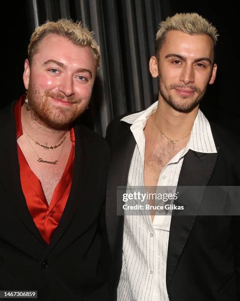 Sam Smith and partner Christian Cowan pose backstage at the hit musical "Some Like it Hot" on Broadway at The Shubert Theater on February 17, 2023 in...