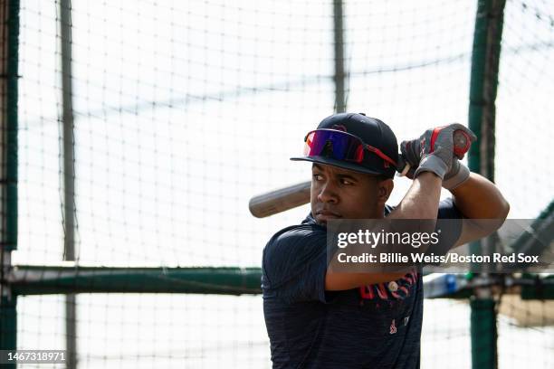 Emmanuel Valdez of the Boston Red Sox warms up during a Boston Red Sox spring training team workout on February 17, 2023 at jetBlue Park at Fenway...