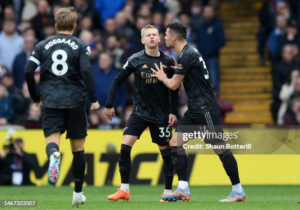 Oleksandr Zinchenko of Arsenal celebrates after scoring the team's second goal during the Premier League match between Aston Villa and Arsenal FC at...