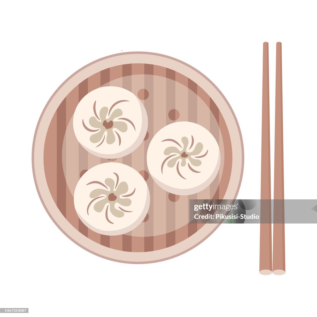 Traditional Chinese dumplings in a bamboo steamer basket. Asian cuisine.