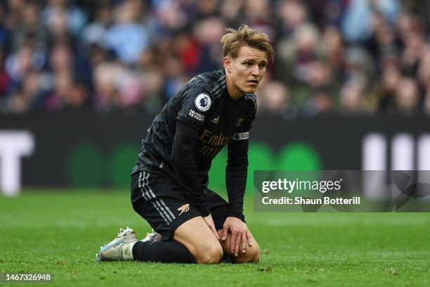 Martin Odegaard of Arsenal reacts after a missed chance during the Premier League match between Aston Villa and Arsenal FC at Villa Park on February...