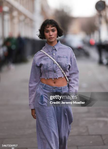 Edie Liberty Rose seen wearing a matching look with a cropped purple jeans blouse and a wide leg purple jeans with bright flat shoes before the Mark...