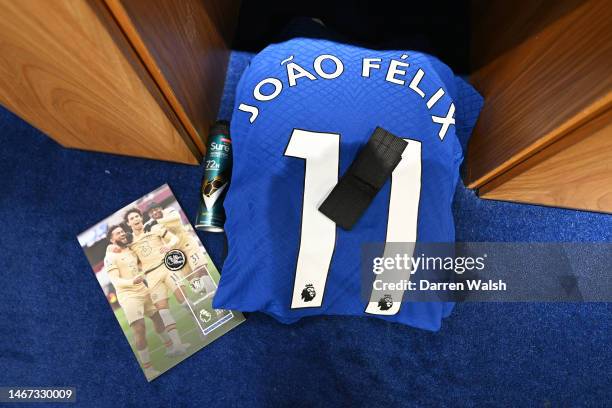 Detailed view of the shirt of Joao Felix of Chelsea on the inside of the Chelsea changing room, with a 'No Room For Racism' pin badge and a Black...