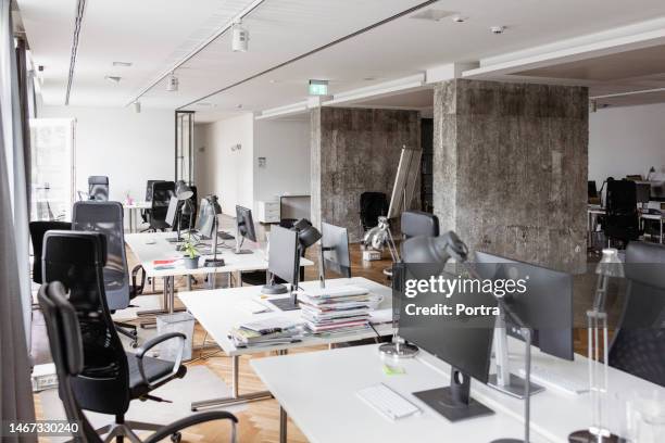 interior of modern work place with furniture - empty desk stock pictures, royalty-free photos & images