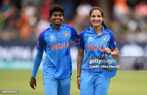 Renuka Thakur of India looks on alongside team mate Pooja Vastrakar after taking 5 wickets during the ICC Women's T20 World Cup group B match between...