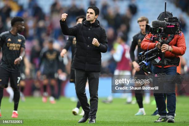 Mikel Arteta, Manager of Arsenal, celebrates with the fans after the team's victory during the Premier League match between Aston Villa and Arsenal...