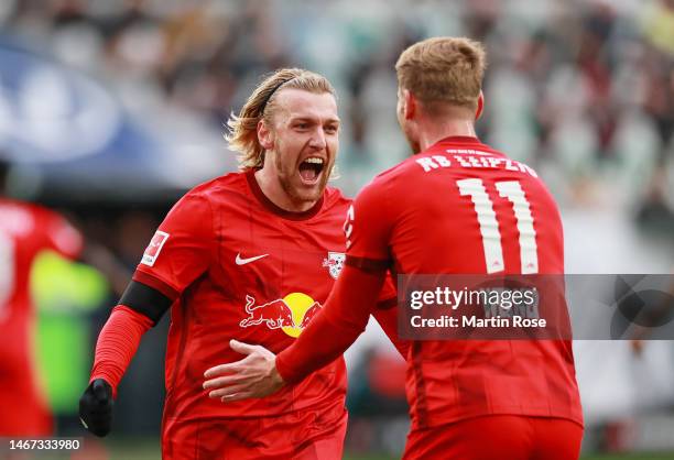 Emil Forsberg of RB Leipzig celebrates after scoring the team's first goal during the Bundesliga match between VfL Wolfsburg and RB Leipzig at...
